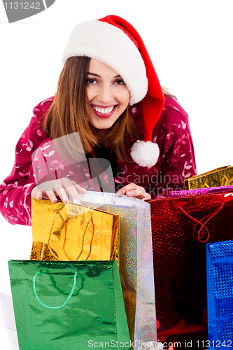 Image of young lady with christmas gifts