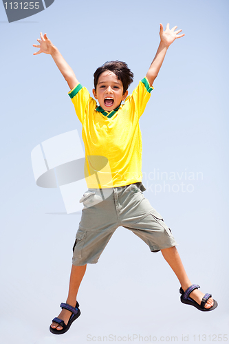 Image of Smart kid jumping high in air