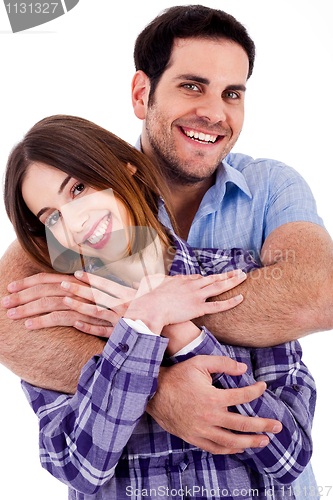 Image of Handsome male emcbracing woman