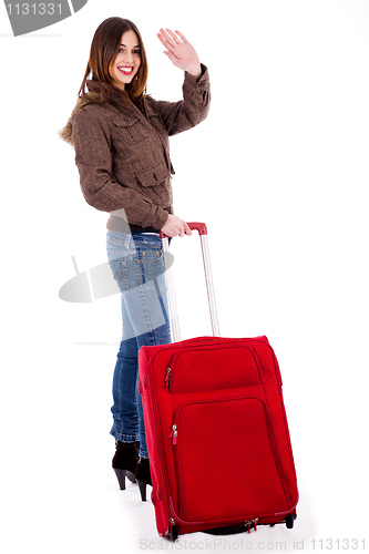 Image of young woman waving hand