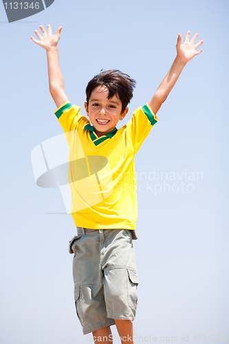 Image of Young kid with raised arms
