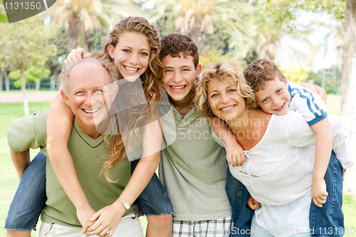 Image of garandparents giving piggyback ride