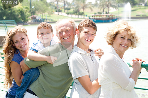 Image of image of Portrait of a happy family standing in a line