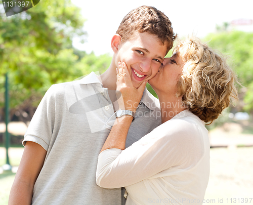 Image of Image of Portrait of a happy senior woman kissing grandson