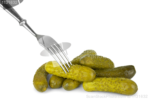 Image of Marinated cornichones and fork