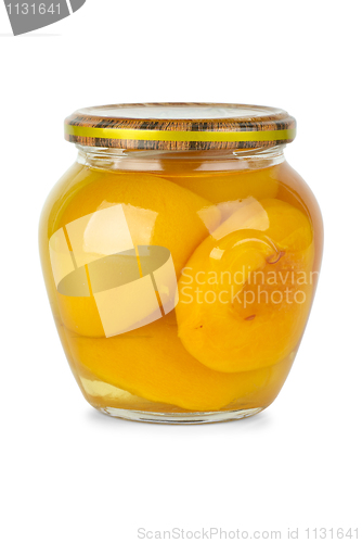 Image of Glass jar with conserved peach fruits