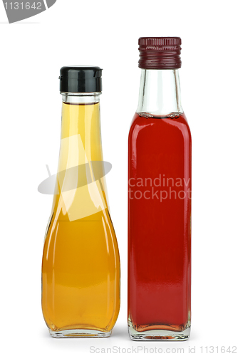 Image of Two bottles with apple and red wine vinegar