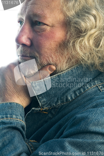 Image of handsome middle age man denim jacket