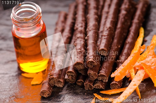 Image of chocolate sticks with orange