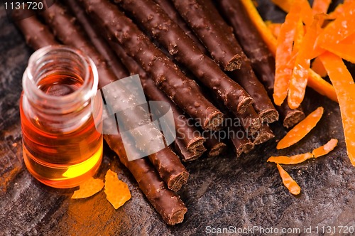 Image of chocolate sticks with orange