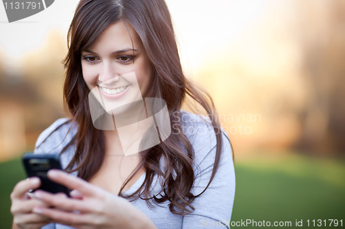 Image of Woman texting