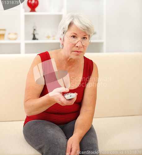 Image of Senior woman looking at TV