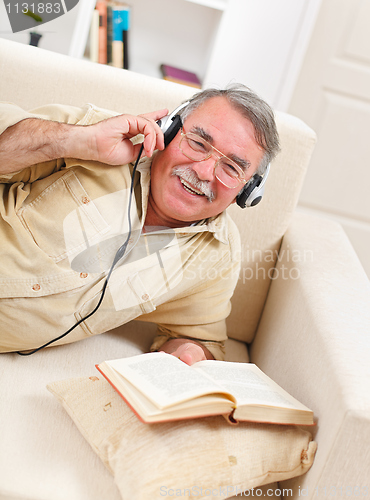 Image of Happy senior men relaxing