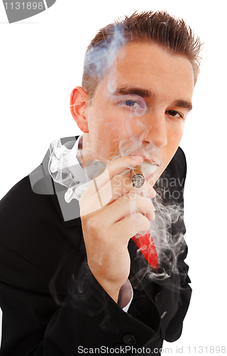 Image of Young man in smoke cloud