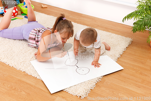Image of Children drawing in room