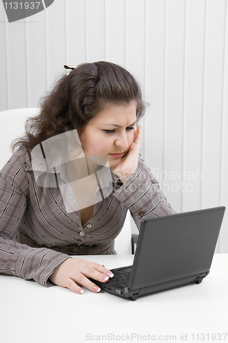 Image of The young woman with the laptop