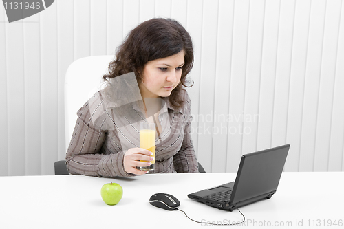 Image of The business girl with the laptop