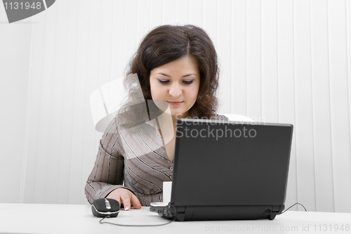 Image of The serious girl with the laptop