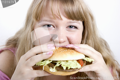 Image of The young woman and hamburger