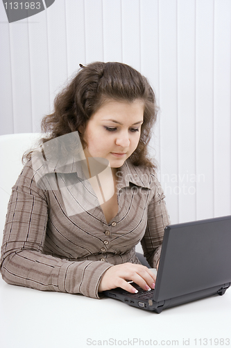 Image of The serious girl with the laptop
