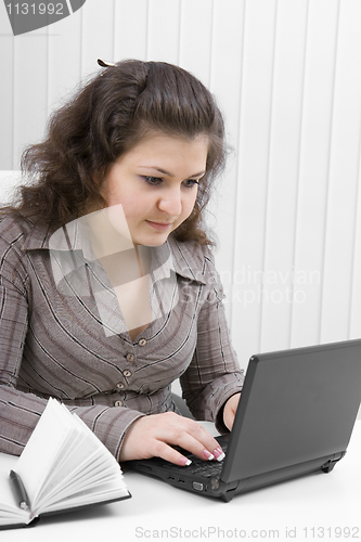Image of The girl with the laptop
