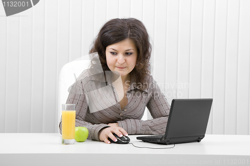 Image of The business girl with the laptop