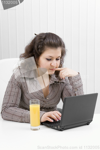 Image of The young business woman at office
