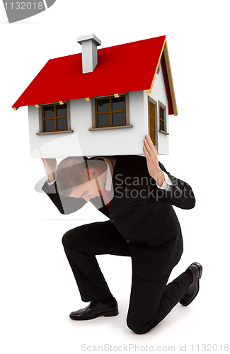 Image of Business man holding house on his back