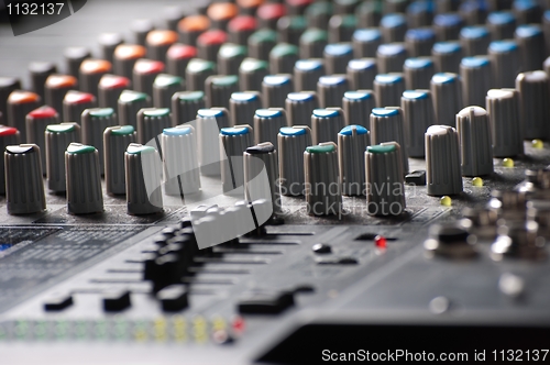 Image of Part of an audio sound mixer with buttons