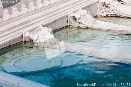 Image of classic roman monument sunk in water