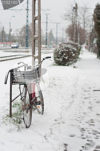 Image of old bicyicle in winter snow