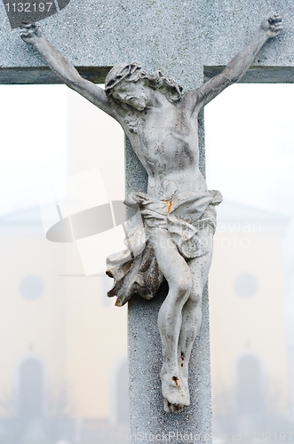 Image of Stone cross with Jesus Christ crucifixion
