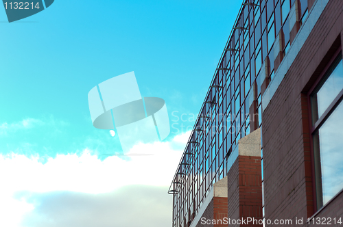 Image of Modern building with blue sky