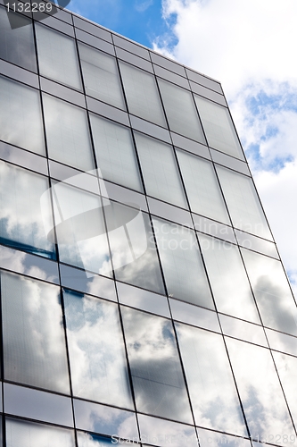Image of Modern office building with reflection of the sky