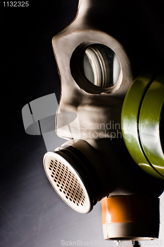 Image of Dark gasmask on enlighted background