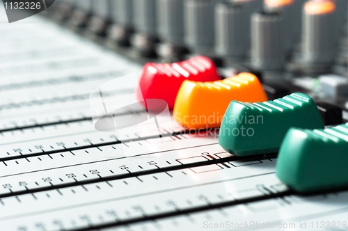 Image of Part of an audio sound mixer with buttons