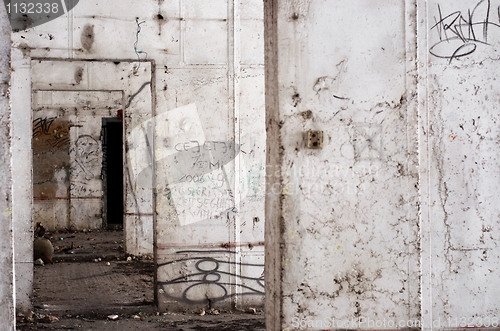 Image of Abandoned building interior with white walls