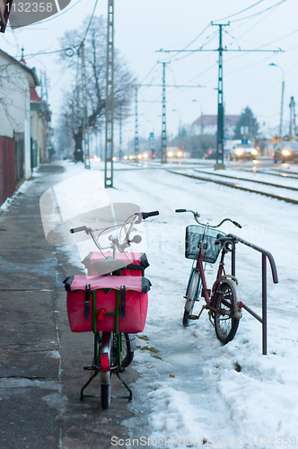 Image of Old post bicycle with traffic in background