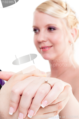 Image of Bride and groom holding hand