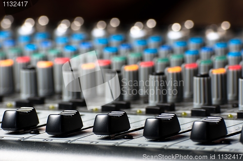 Image of Part of an audio sound mixer with buttons