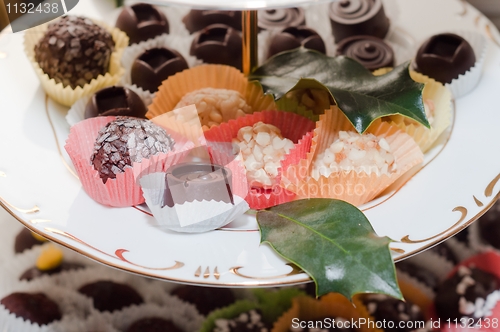 Image of A plate of chocolates with other treats