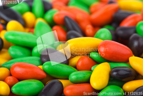 Image of Abstract backgroundof glazed sunflower seeds (focused on lower image part)