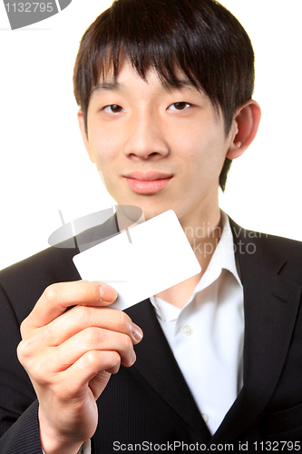 Image of businessman with empty card in hand 