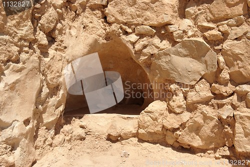 Image of Triangular niche in ancient stone  wall 