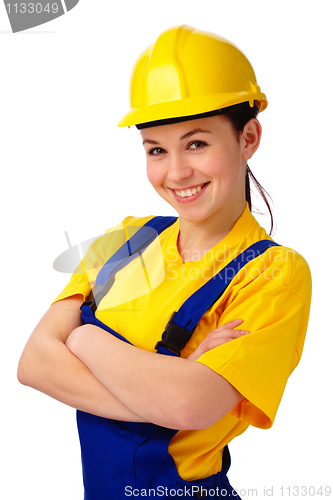 Image of Young beautiful woman in construction uniform