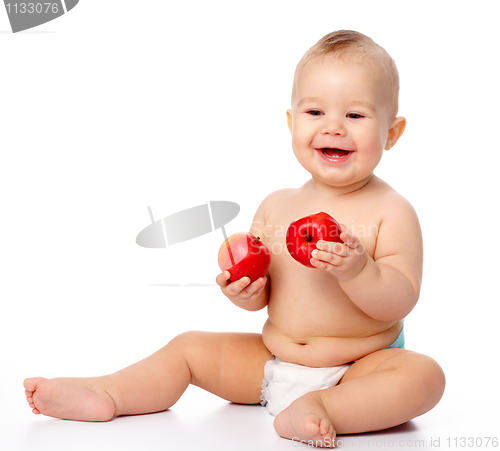 Image of Little child with apple