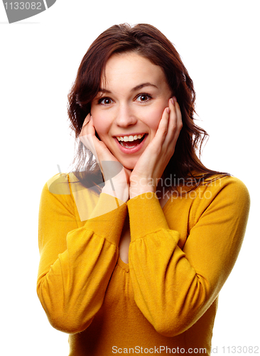 Image of Girl holding her face in astonishment