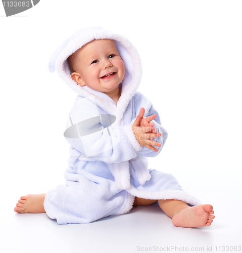 Image of Cute child in bathrobe