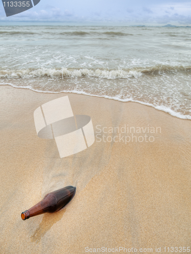 Image of Bottle at seashore