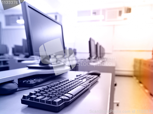 Image of workplace room with computers